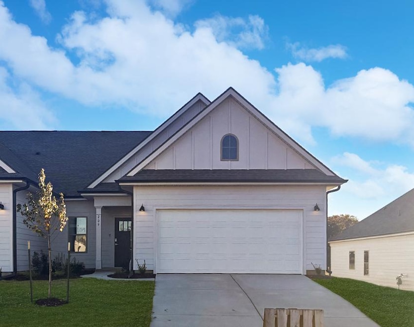 brick home exterior with 2 car garage