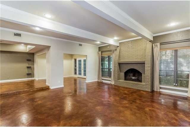 Working fireplace and stained concrete