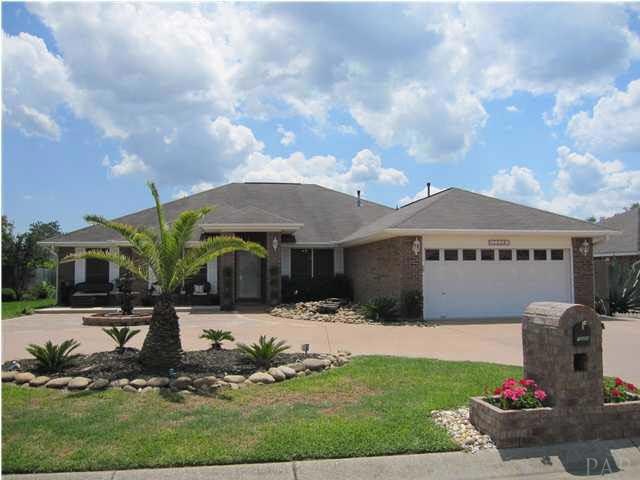 Welcome to 7228 Rampart Way! Circular driveway for ease of exit & entry! Relax on your front porch to the sounds of the water fall!
