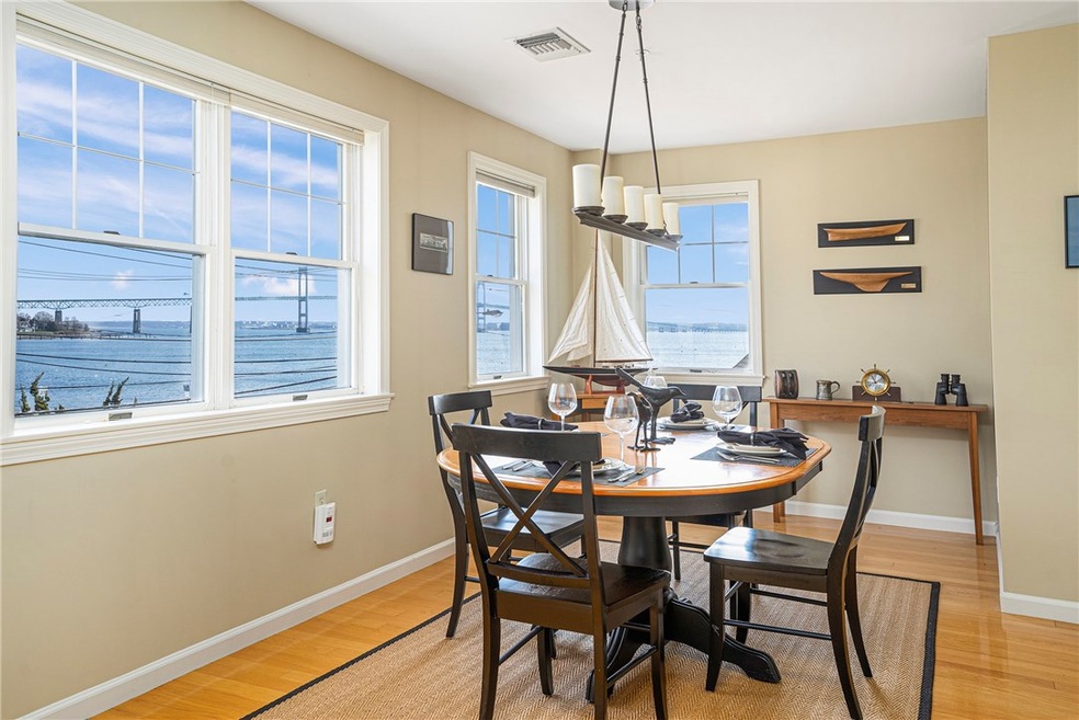 Dining Room with hardwood floors and amazing Newpo