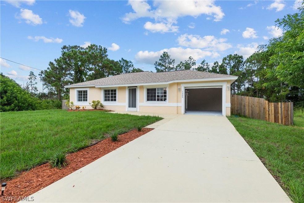 1206 Jaguar Blvd, Lehigh Acres, FL 33974 - photo 1