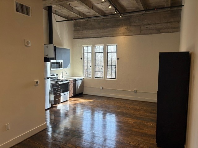 This kitchen is filled with sleek lines, modern ap