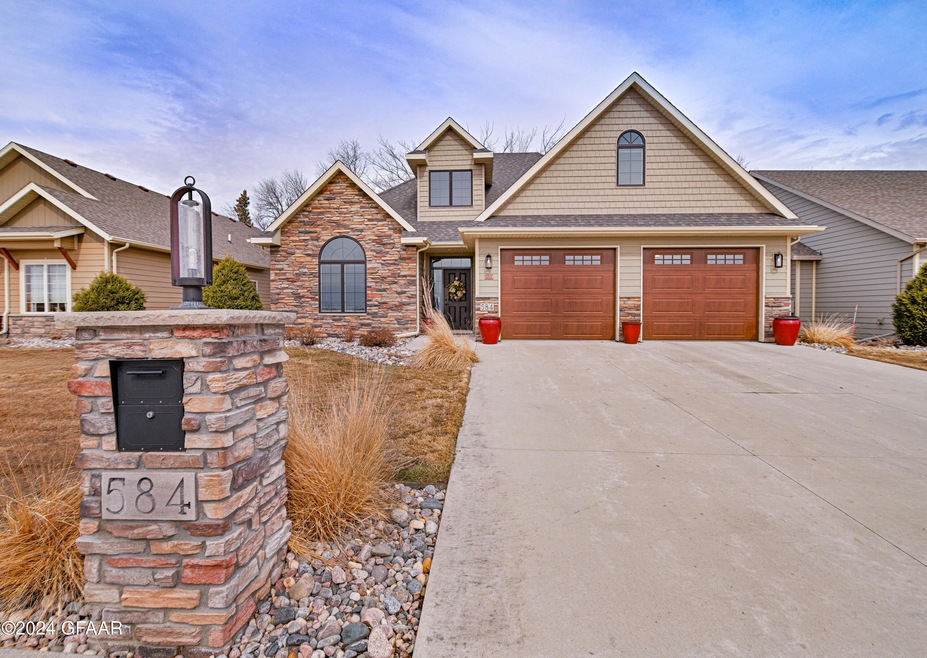 584 Autumn Woods Blvd, Grand Forks, ND 58201 - photo 1