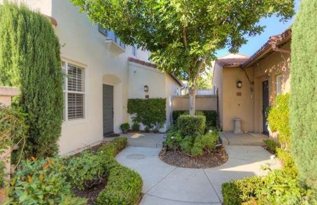 Lovely courtyard entry. Front landscape is maintai