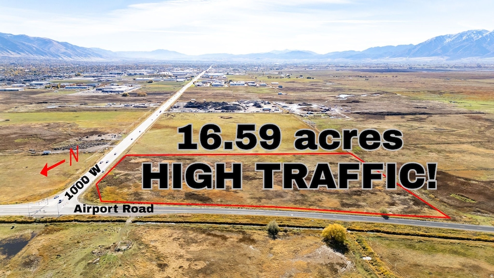 Aerial view of property's location with mountains and property parcel outlined
