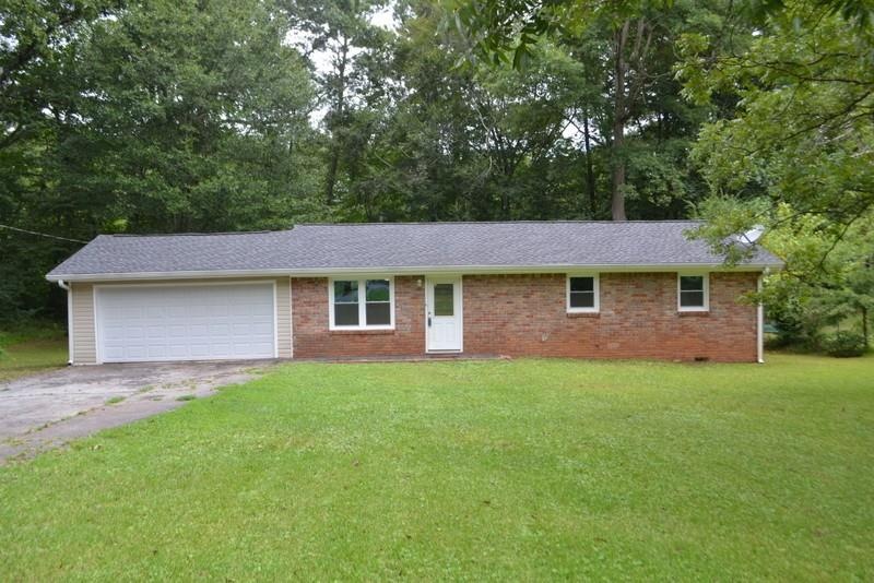 THIS ADORABLE RANCH ON 1.24 ACRES HAS 3 SIDES BRIC