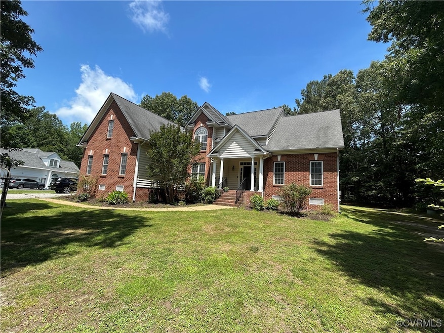 View of front of home featuring brick siding, craw