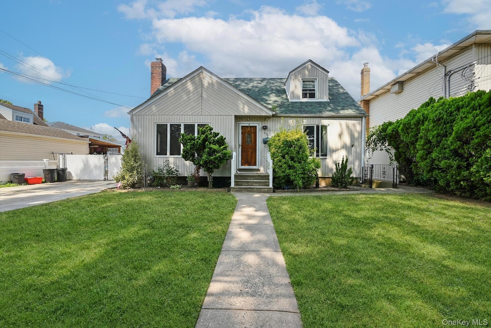 296 Benson Ave, Elmont, NY 11003 - photo 1