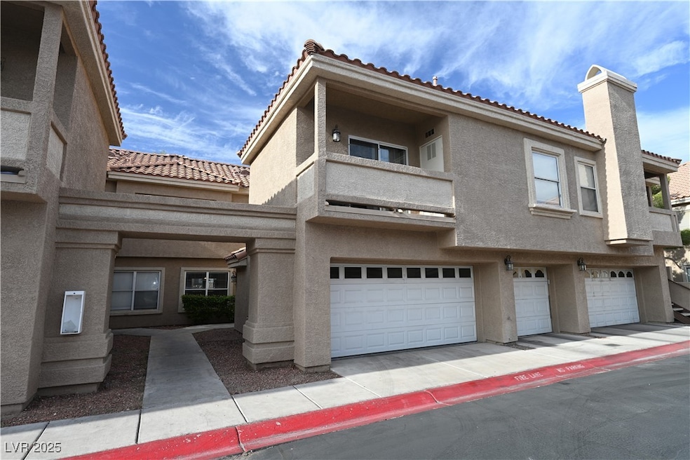Multi unit property with stucco siding, a tiled ro