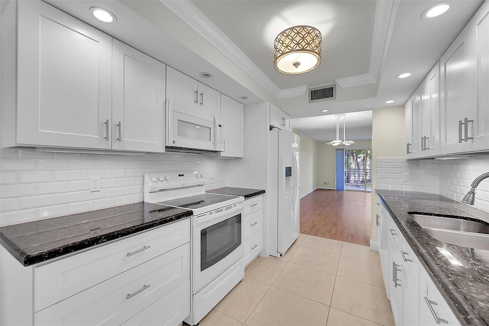 1802 Eleuthera Point unit E2, Coconut Creek, FL 33066 - photo 1