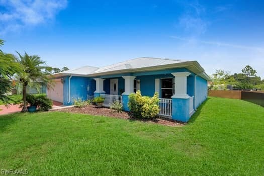 711 Downer Ave S unit 1, Lehigh Acres, FL 33974 - photo 1