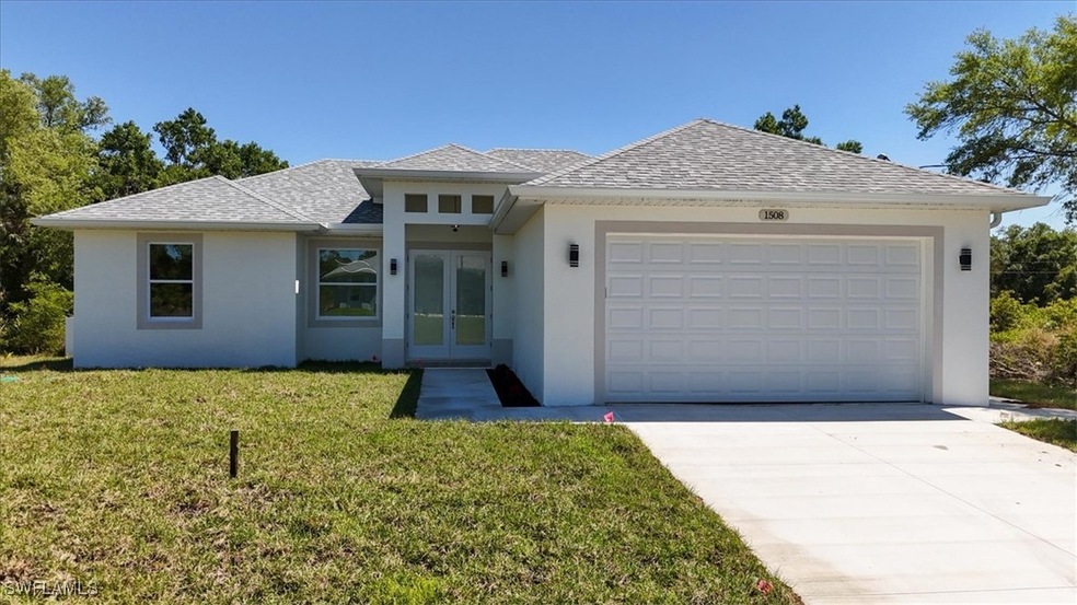 View of front of property featuring stucco siding,
