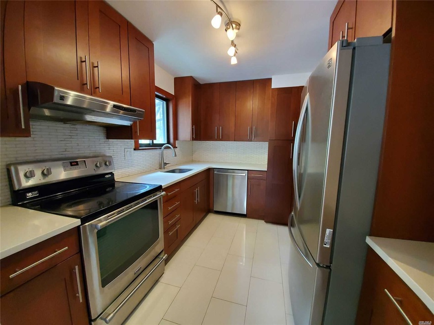 24054 69th Ave unit 1FL, Douglaston, NY 11362 - photo 1