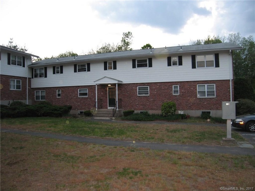 Exterior front-This is a first floor end Unit