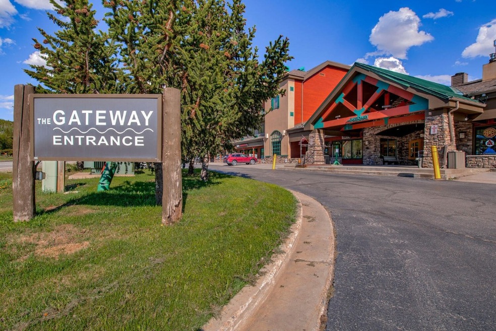 Community sign with a lawn