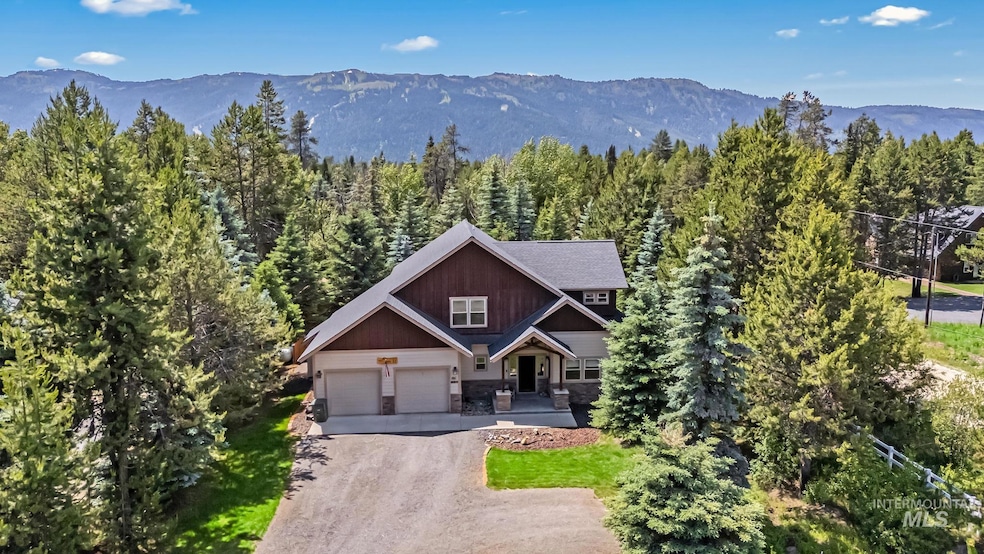 Mountain view featuring a heavily wooded area