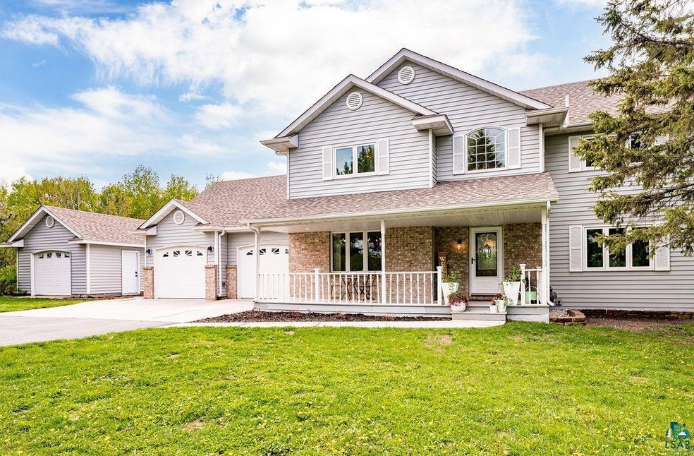 View of front of house featuring covered porch, a 