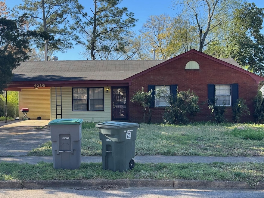 Ranch-style house featuring brick siding, an attac