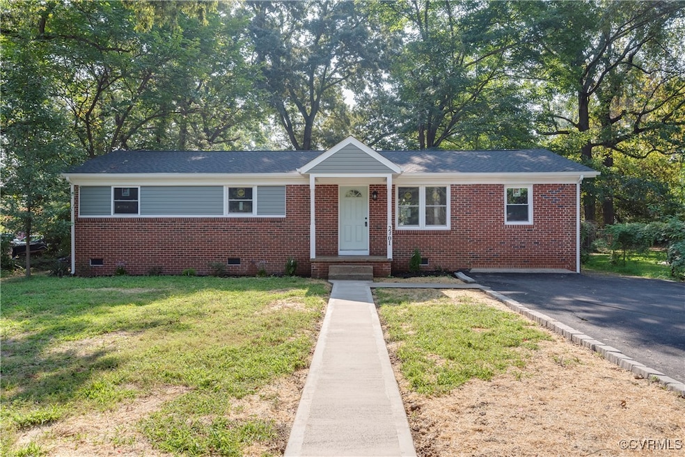 Ranch-style home with a front lawn