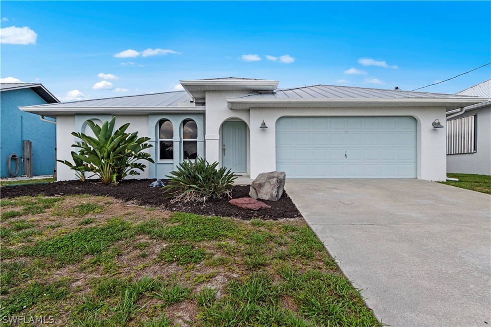 Single story home featuring a garage