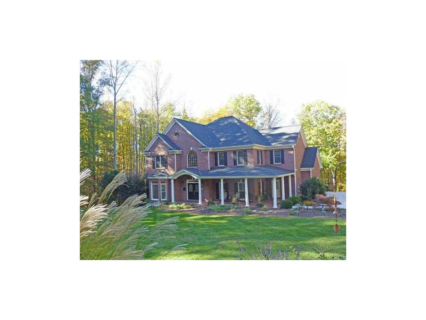 Exterior Front. 4-sided brick, beautifully landsca