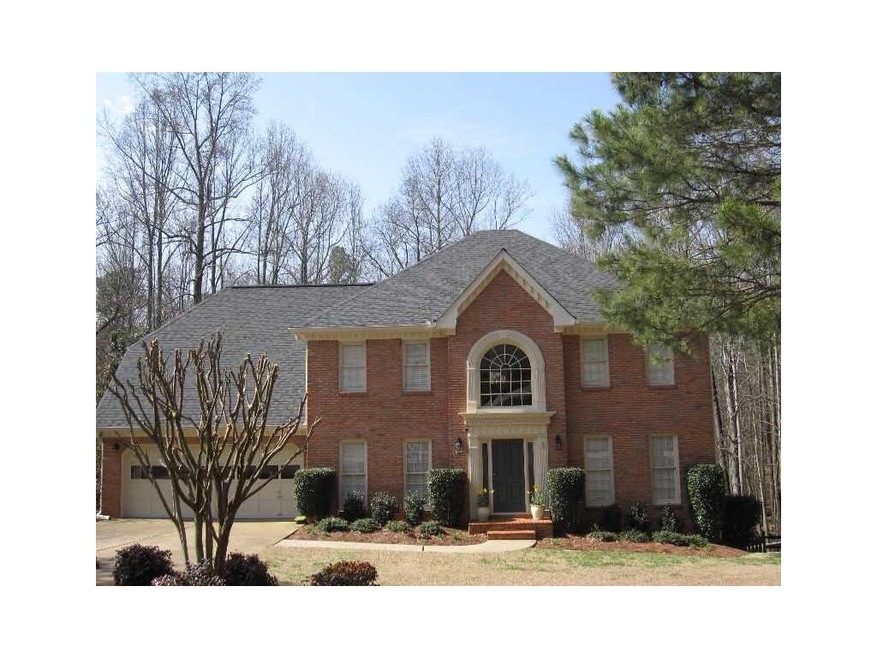 Exterior Front. Classic traditional brick home sit
