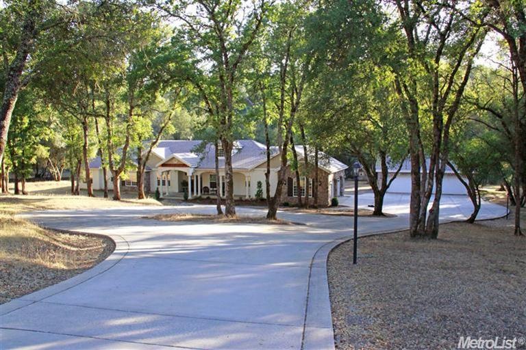 Welcome to this exquisite home on 5 useable acres 