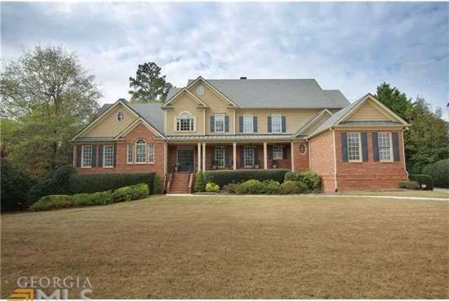 Gorgeous curb appeal awaits at this 6 bedroom, 6 a