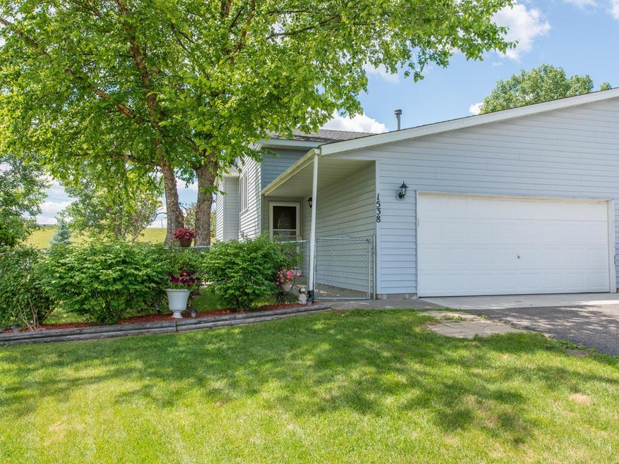 Twin home no Association dues. Yard is completely 