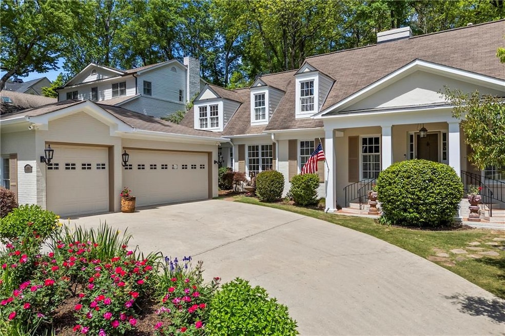 View of front of property with a front lawn, drive