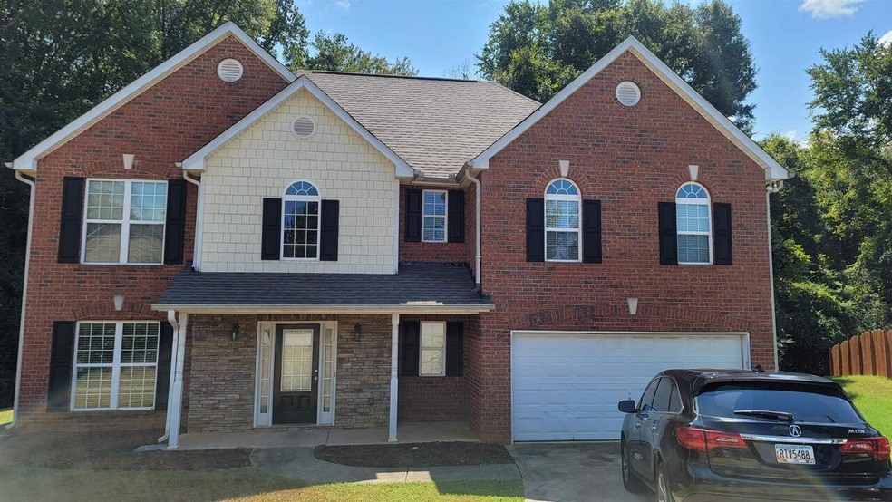 710 Dellrose Trace unit 94, McDonough, GA 30253 - photo 1