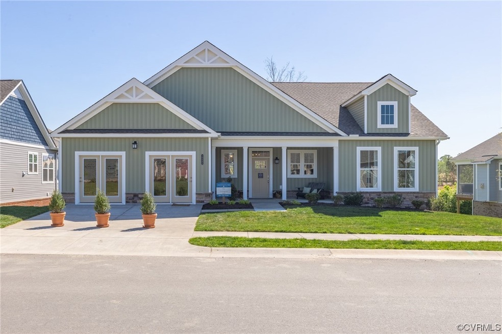 Craftsman inspired home with french doors and a fr