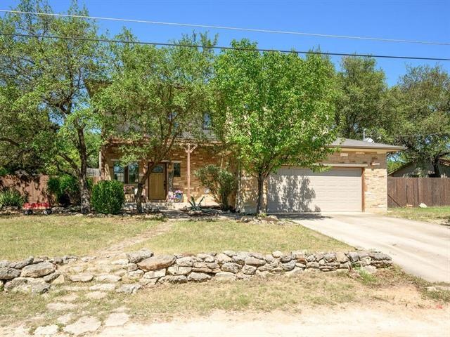 Nice curb appeal with some large trees for shade / blockage of summer sun.