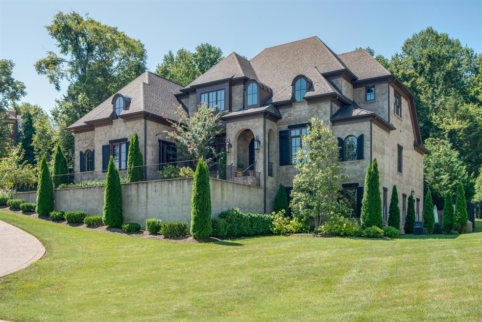 Created by renowned Grove Park Construction and located in Brentwood's exclusive Governor's Club, this Tudor manor is a masterpiece of design and craftsmanship.