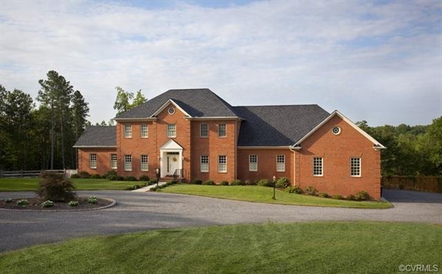 Stately 5 bedroom brick home on 20 acres backing u