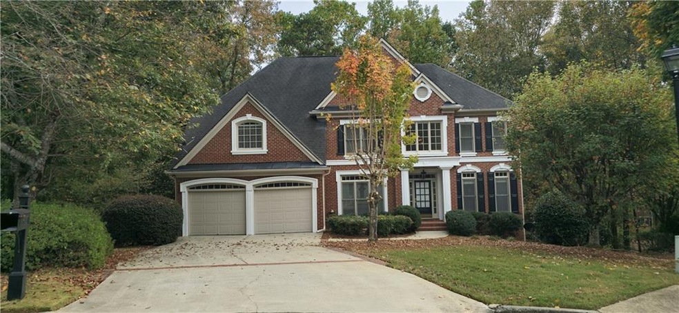 View of front of property featuring a front yard a