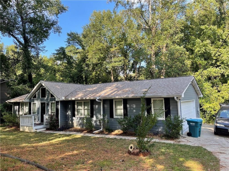 1056 Oak Rd SW, Lilburn, GA 30047 - photo 1