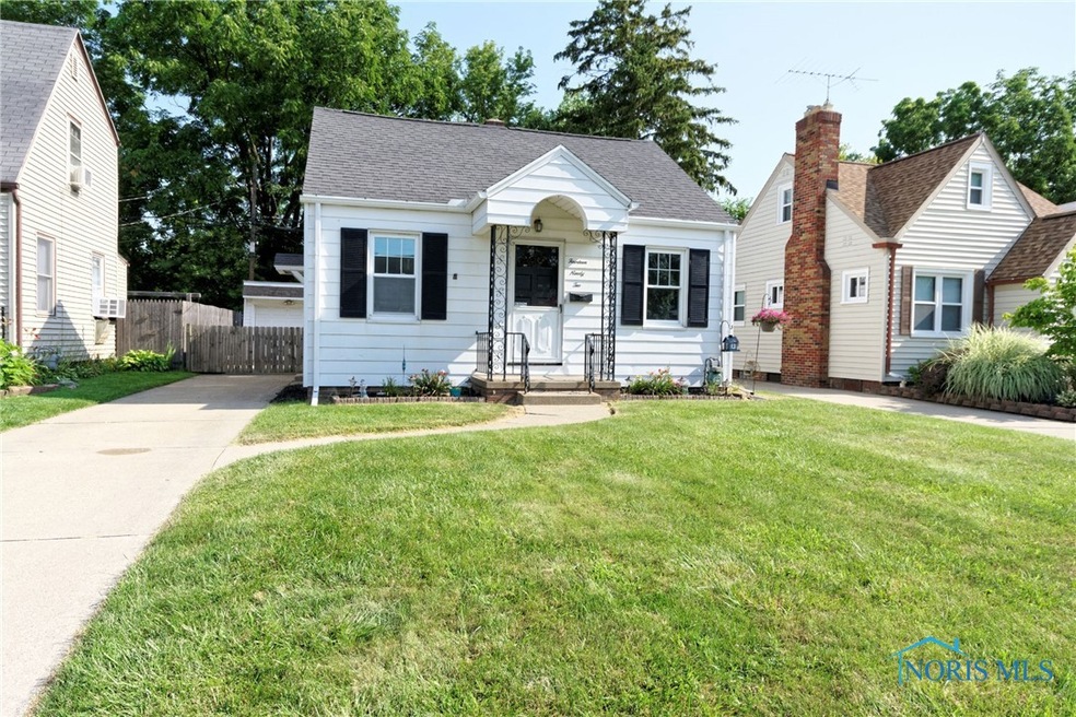 FRONT VIEW WITH GARAGE