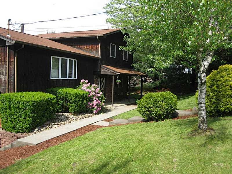 Exterior Front. Walk up to this cedar and brick ho