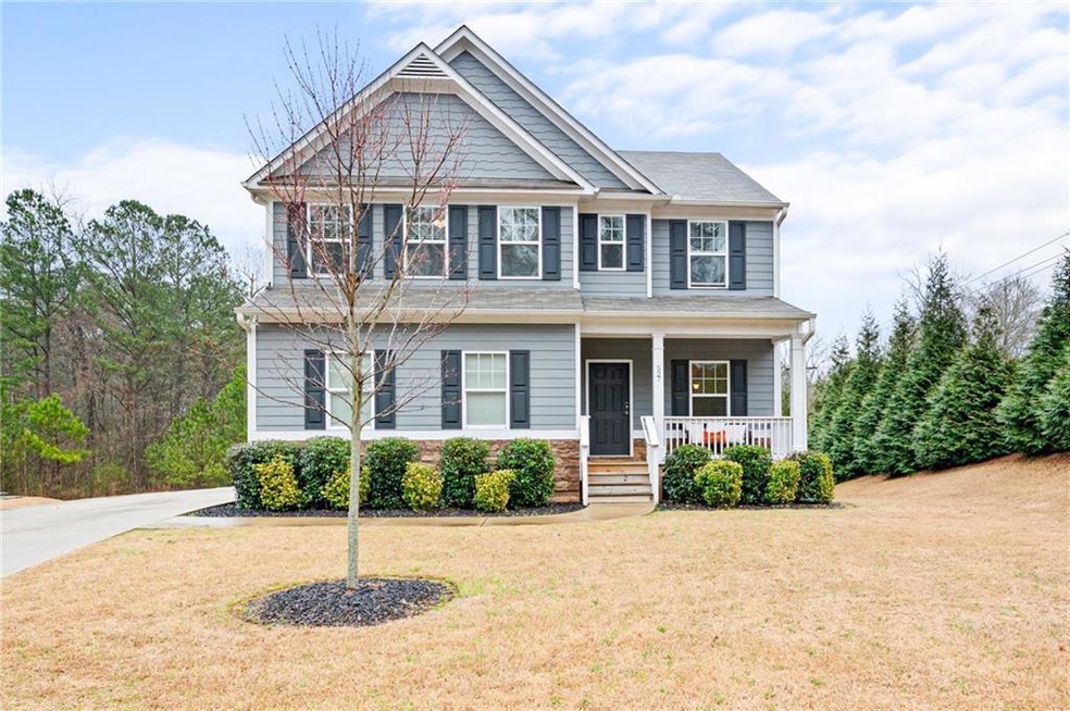 Charming curb appeal welcomes you to this lovely h