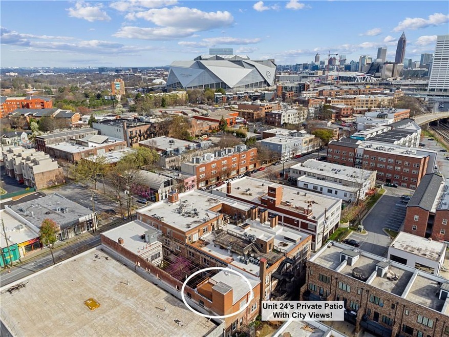 Aerial view of property and unit 24's PRIVATE ROOF