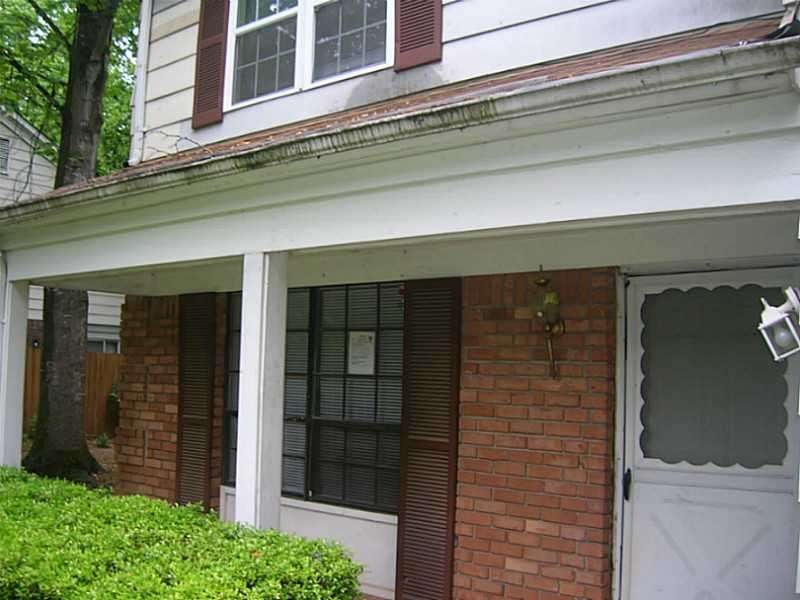 Exterior Front. Green space.