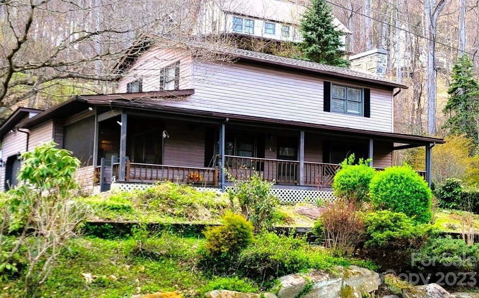 Covered front porch & side Screened porch