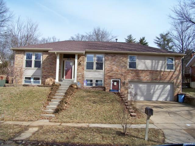 WELCOME TO THIS SPACIOUS RAISED RANCH WITH BRICK IN FRONT AND BOTH SIDES -  WONDERFUL CURB APPEAL!