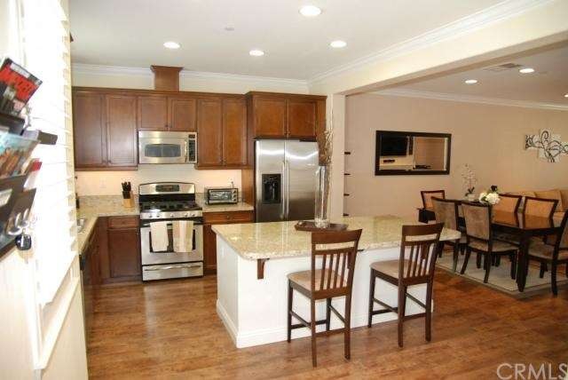 Be uplifted by 10-foot ceilings highlighted by lux