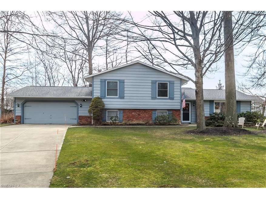 Enjoy this quaint split level home situated on a q