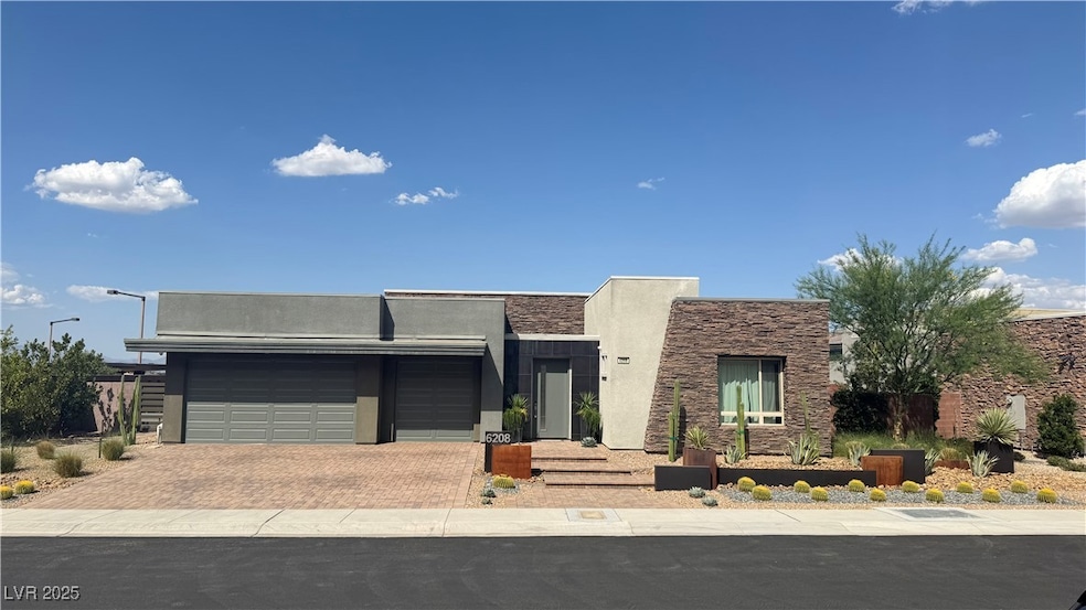Modern home with an attached garage, decorative dr