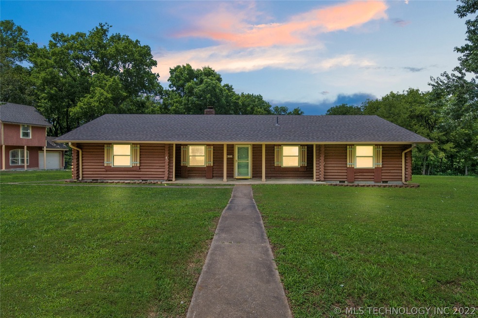 Front of Log Cabin Evening