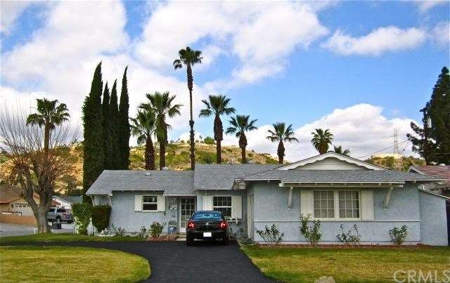 Attractive single-story home with a circular drive