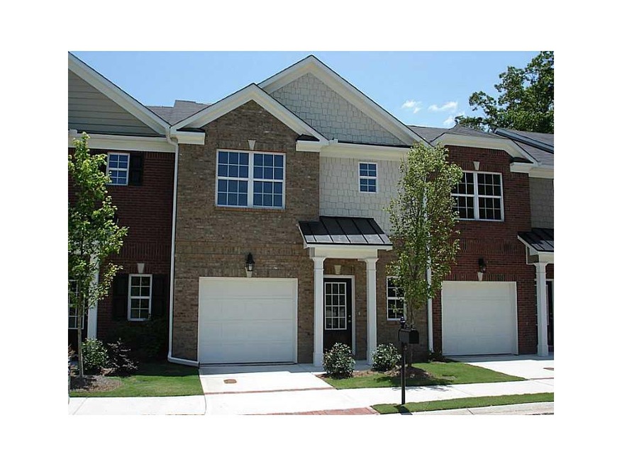 Facade/Exterior Front. Brick front, cement siding 